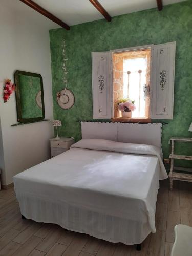 Cama o camas de una habitación en Fattoria La Traccia