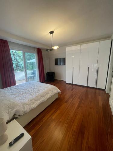 Postel nebo postele na pokoji v ubytování Villa Mariel Lago Maggiore