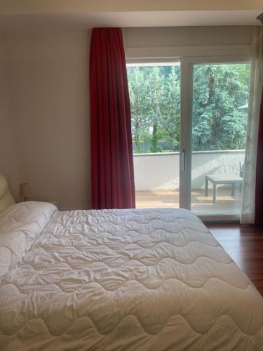 Postel nebo postele na pokoji v ubytování Villa Mariel Lago Maggiore