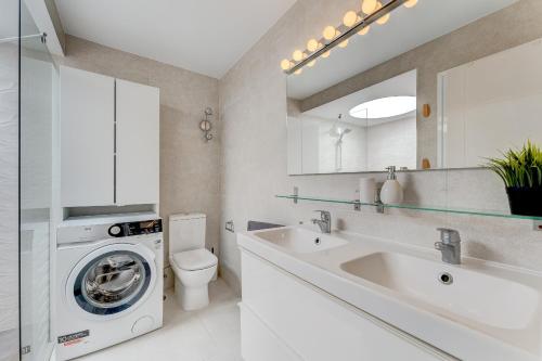 Ένα μπάνιο στο Beautiful bungalow in Island Village