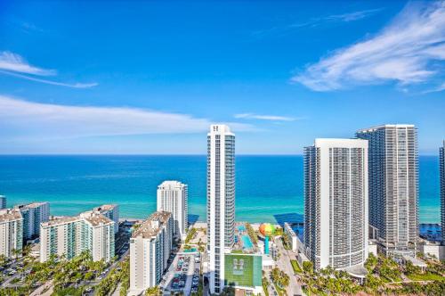 a view of a city with skyscrapers and the ocean at Splendid Resort - Oceanview 1BDR & 1BA Apt Right on the Beach, Heated pool, GYM in Hollywood