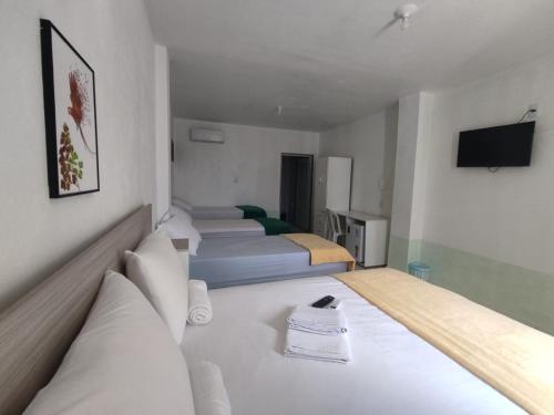Postelja oz. postelje v sobi nastanitve Amazônia Praia Hotel