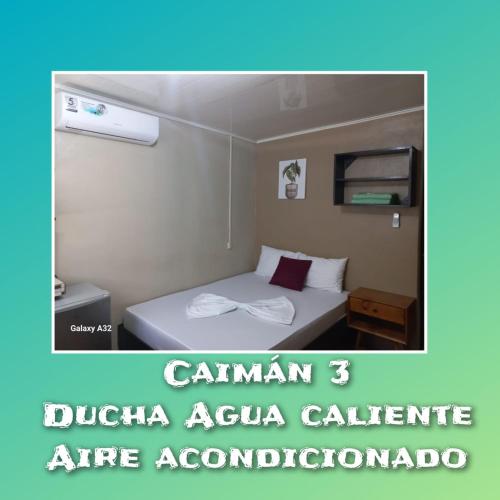 Ένα ή περισσότερα κρεβάτια σε δωμάτιο στο Apartamentos Caimán 3