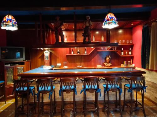 a bar in a room with chairs around it at ESPACIO CIBELES in Sax