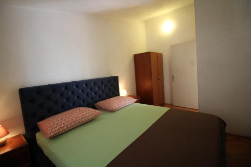 Кровать или кровати в номере Makarska centre & free private parking