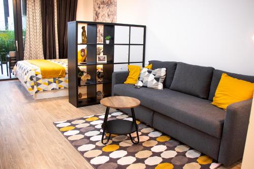 a living room with a couch and a table at Apartment Figurin in Dubrovnik