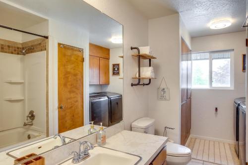 A bathroom at Spirit Lake Home with Fenced Yard 1 Mi to Water!