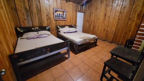 an overhead view of a room with two beds at Hotel de Montaña Buena Vista in Río Chiquito