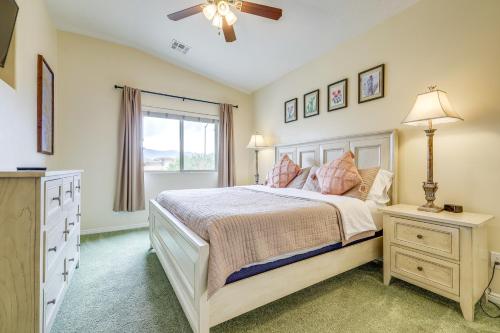 a bedroom with a large bed and a window at Mesquite Vacation Rental - Close to Golf Courses! in Mesquite