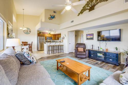 a living room with a couch and a table at Mesquite Vacation Rental with Pool Access! in Mesquite