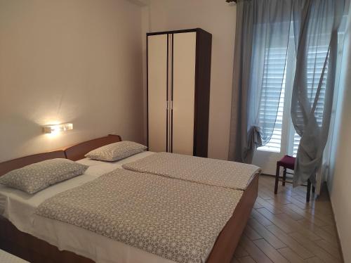 Postel nebo postele na pokoji v ubytování Apartment Rukavina