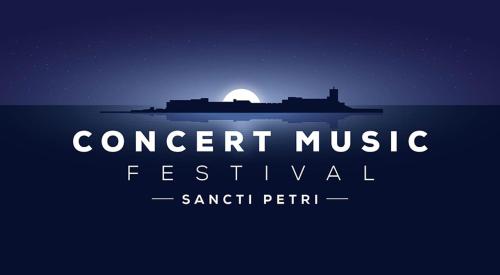a sign that reads concert music festival at night at The Farm Tiny House - Tiny Casa in Chiclana de la Frontera