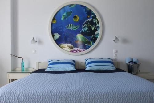 Postel nebo postele na pokoji v ubytování Dimitra's Sea-Crafts Boutique Studios