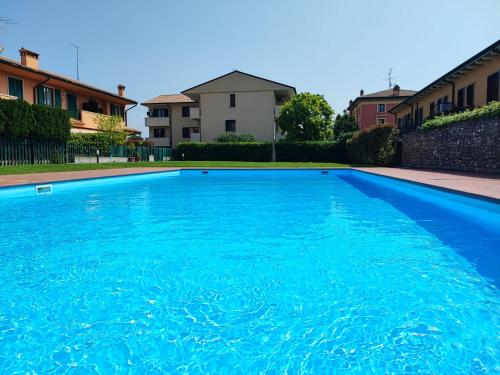 Πισίνα στο ή κοντά στο Private Garden Giardino Privato a Bardolino - House Amorino