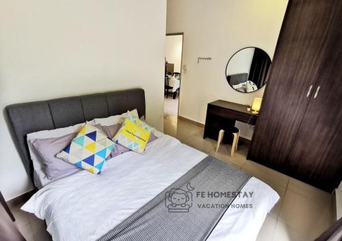 Кровать или кровати в номере FE Cozy Cameron Homestay Family 8 pax 3BR Palas Horizon Brinchang 金马伦民宿 8人3房