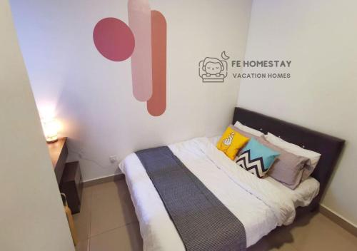 Кровать или кровати в номере FE Cozy Cameron Homestay Family 8 pax 3BR Palas Horizon Brinchang 金马伦民宿 8人3房
