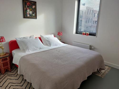 Postel nebo postele na pokoji v ubytování Medina B&B hartje Arnhem