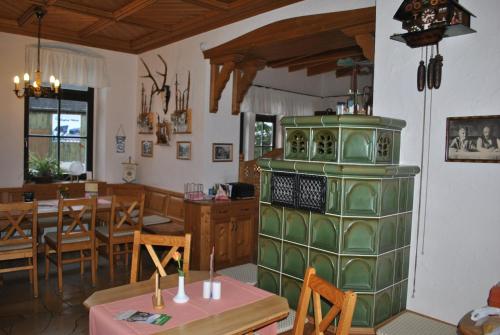 A restaurant or other place to eat at Gasthof & Pension Brettmühle