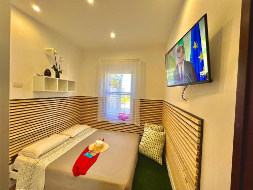 a bedroom with a bed with a toy on it at Villa Latino in Vieste