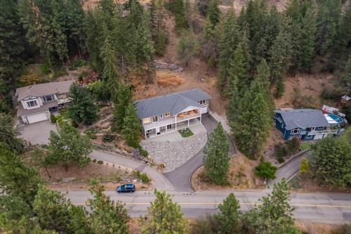 an aerial view of a house in the woods at Heaven's Haven in Vernon