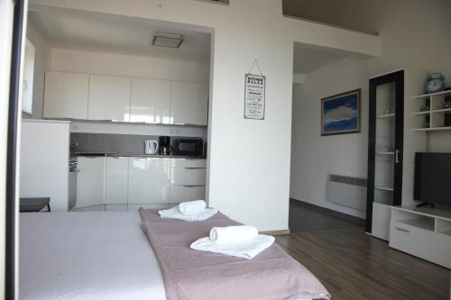 Postel nebo postele na pokoji v ubytování Apartments Sonne 2