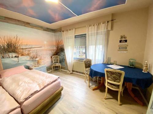 Postel nebo postele na pokoji v ubytování Gästehaus Monschau