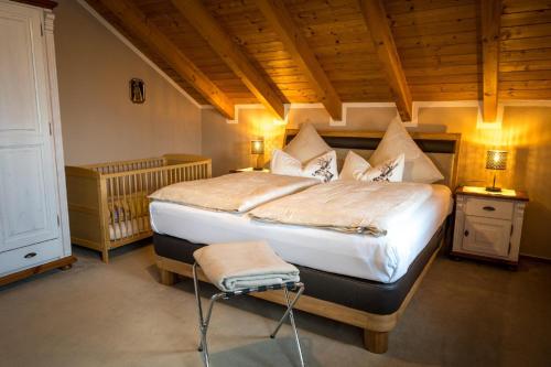 Ένα ή περισσότερα κρεβάτια σε δωμάτιο στο Ferienbauernhof Rosenberger