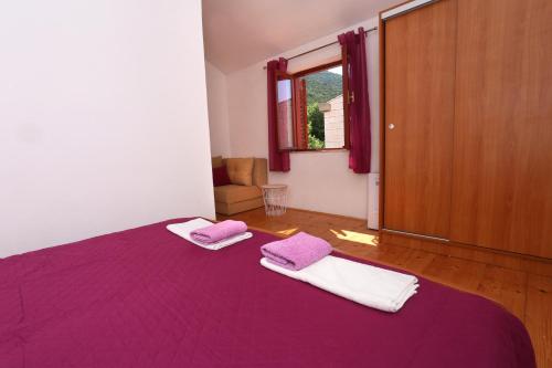 Ένα ή περισσότερα κρεβάτια σε δωμάτιο στο Guest House Roses