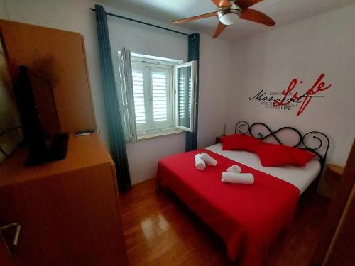 Postel nebo postele na pokoji v ubytování Sweet apartment Marijana