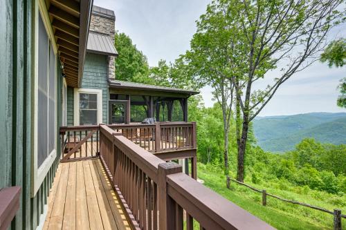 a deck with a view of the mountains at On 22 Acres Cullowhee Craftsman Home with Mtn Views in Cullowhee