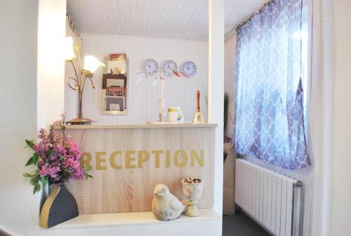 The lobby or reception area at Family Hotel Apolonia