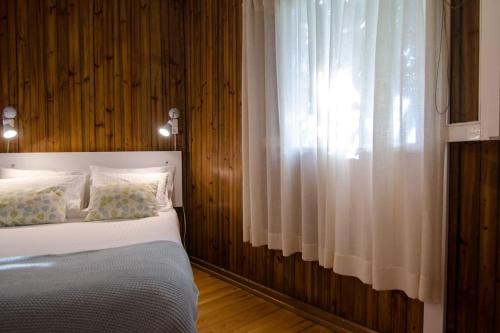 Säng eller sängar i ett rum på Douro Charming Chalet