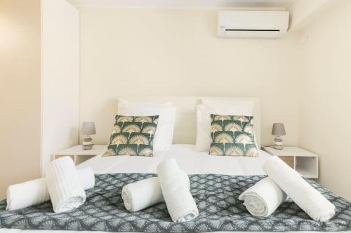 מיטה או מיטות בחדר ב-Bel Appartement Juan les Pins