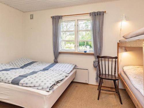 Postel nebo postele na pokoji v ubytování Holiday home Højslev XXII