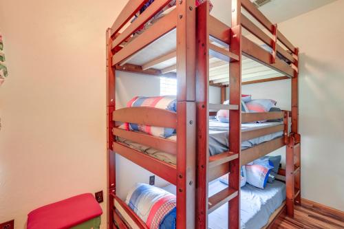 a bunk bed room with bunk beds in a house at Charming Abode with Dock on the Suwannee River in Bell