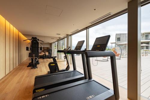 a gym with treadmills and a treadmill at Garden Terrace Nagasaki Hotels & Resorts in Nagasaki