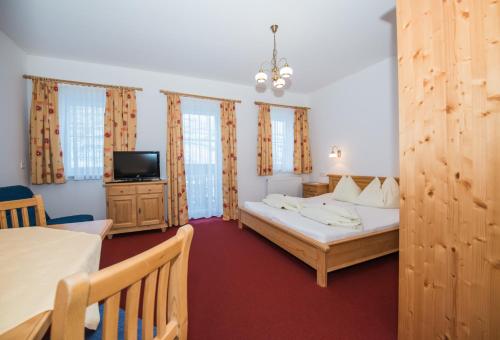 Ένα ή περισσότερα κρεβάτια σε δωμάτιο στο Aparthotel Ederhof