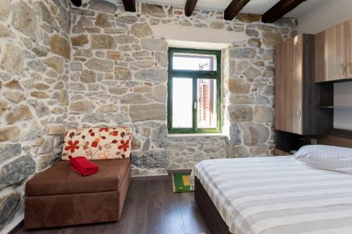 Ένα ή περισσότερα κρεβάτια σε δωμάτιο στο Apartments Zeljko