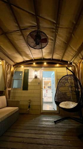 a room with a couch and a ceiling fan at Luxurious Retreat, Parking, Restaurants, Near New Hope, 1mile Delaware River in Lambertville