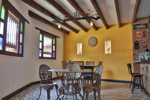 a dining room with a table and chairs at Casa El Retiro - Villa de Leyva in Villa de Leyva