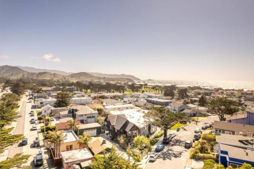 an aerial view of a city with the ocean at Pacifica Storybook Beach House in Pacifica