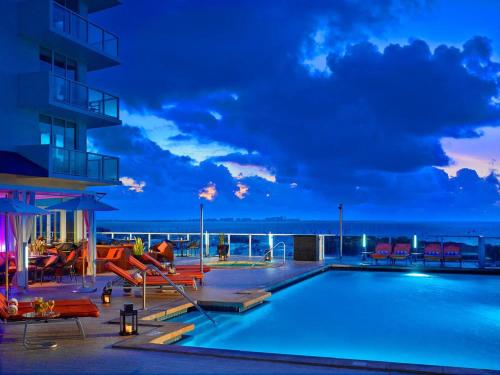 a swimming pool on top of a cruise ship at Stunning 12th Floor Studio In The Heart Of Grove in Miami