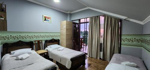 Postel nebo postele na pokoji v ubytování Guesthouse kalakala