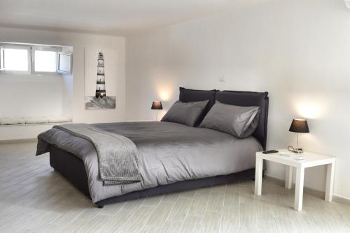 B&B Sparano Luxury Suites tesisinde bir odada yatak veya yataklar
