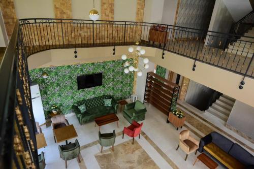 an overhead view of a living room with colorful furniture at KALİYE ASPENDOS HOTEL in Antalya