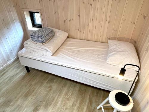 Ένα ή περισσότερα κρεβάτια σε δωμάτιο στο 7 person holiday home in Huglo-By Traum