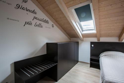 Postel nebo postele na pokoji v ubytování Il B&B di PIAZZA MOTTA