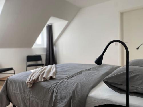 Postel nebo postele na pokoji v ubytování Gemütliche Wohnung nähe Klagenfurt