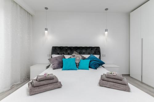 מיטה או מיטות בחדר ב-Dimora Alighieri