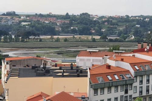 an aerial view of a city with buildings at HyP - A Casa da Fina in Miño